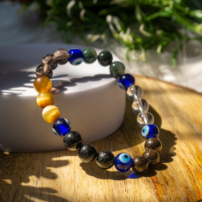 Protection Against Evil Eye Crystal and Stone Combination Bracelet Jewellery 8mm - Evil Eye, Black Tourmaline, Smokey Quartz, Clear Quartz, Bronzite, Cats Eye, Moss Agate.