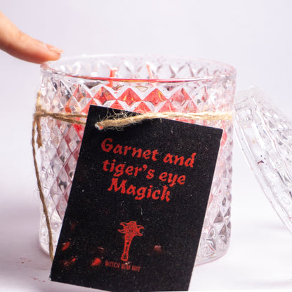 GARNET MAGICK INTENTION CANDLE COLLECTION! with garnet and tiger eye and cinnamon, orris root, juniper berry with the scent of vanilla