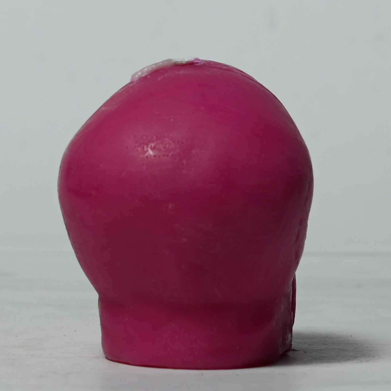 Real Human Skull Figure Candle Dark Pink