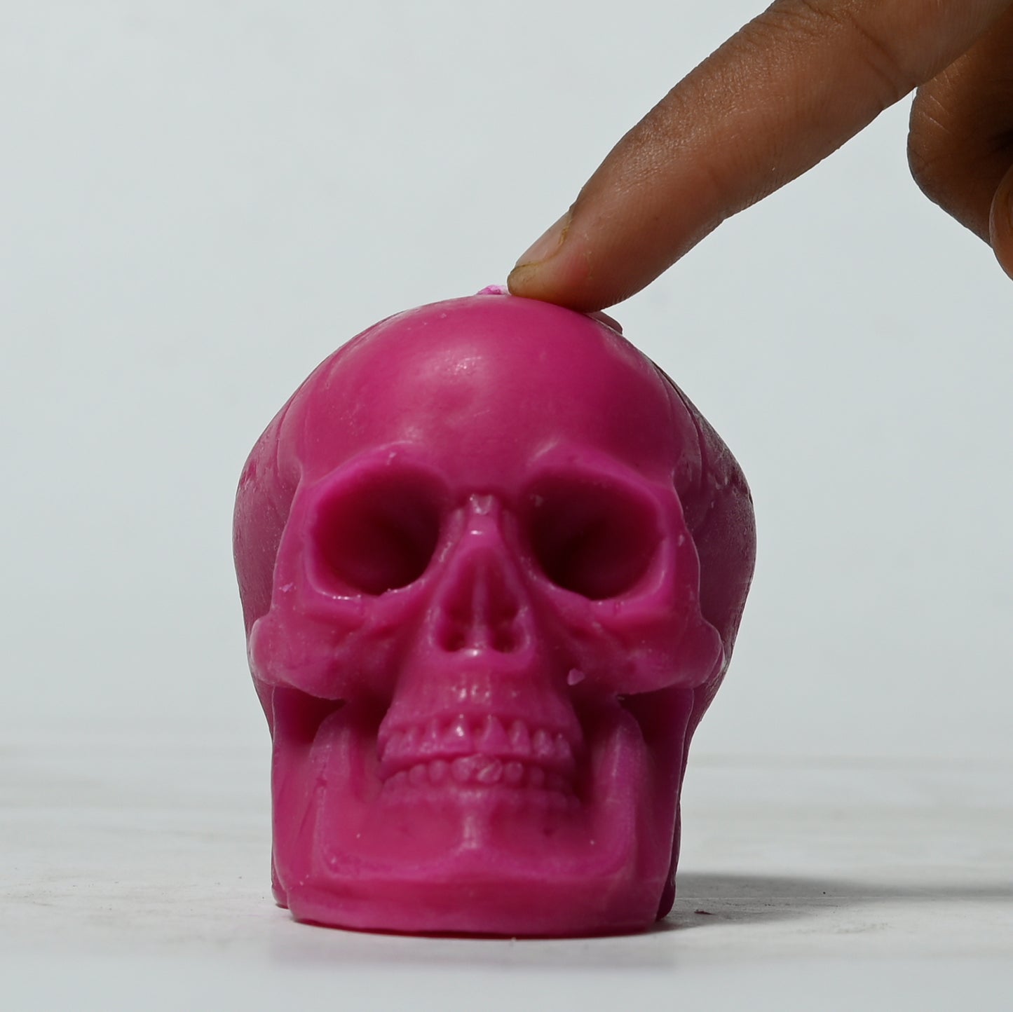 Real Human Skull Figure Candle Dark Pink