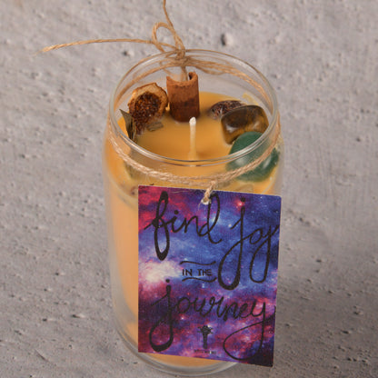 Real Success and victory crystal and herbs infused intention candle celebrating the magnetic properties of devil claw herb Intention Candle with scents of mandarin