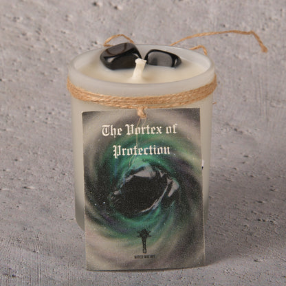 Real Intention Candle Infused with the ever Protective and Grounding and Healing Obsidian Tumbles with undernotes of oud