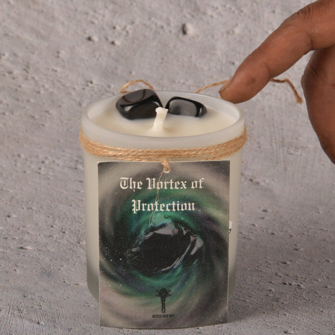 Real Intention Candle Infused with the ever Protective and Grounding and Healing Obsidian Tumbles with undernotes of oud